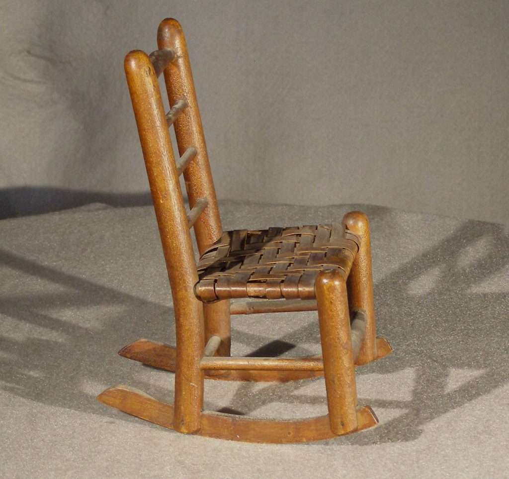 Antique ladder back rocking chair